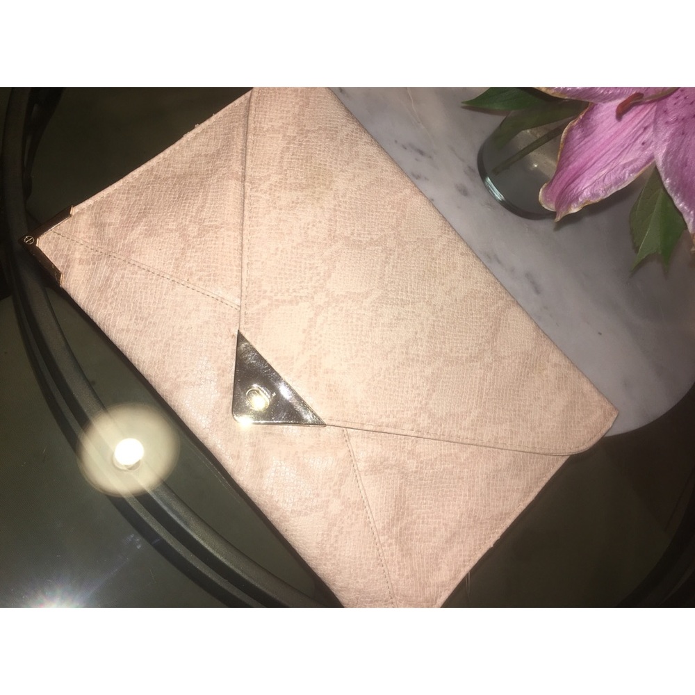 Nude snakeskin clutch